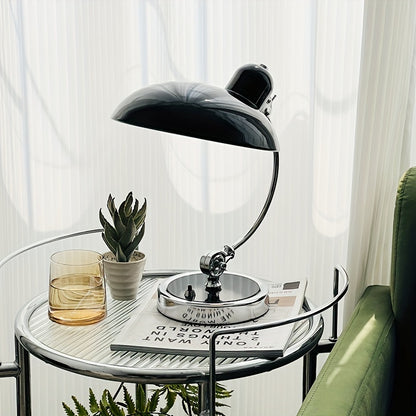 Minimalist and fashionable office desk lamp with creative ironwork, featuring exquisite black or white paint finish, serving as an artistic decorative ambiance table lamp, complete with a bulb.